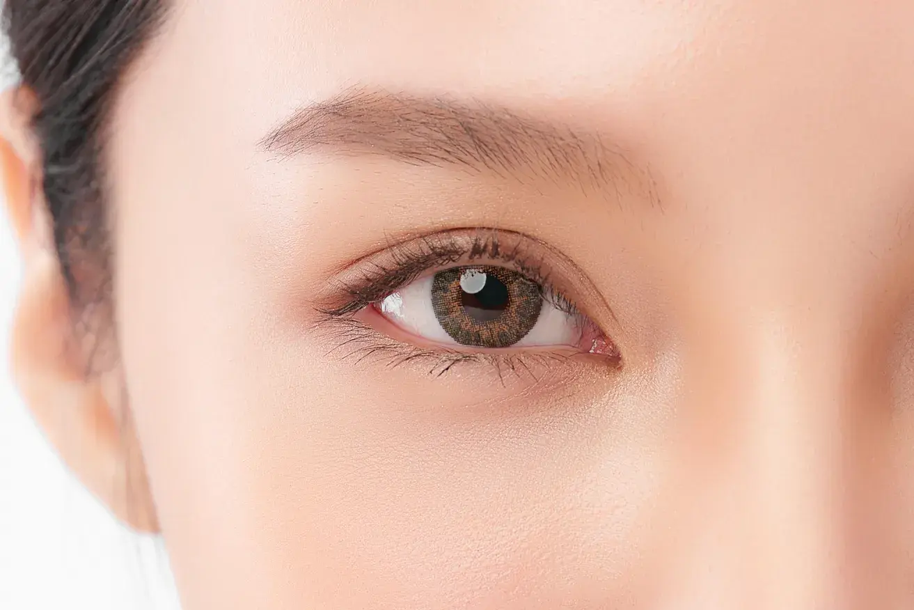 Close-up of a woman with a visible double eyelid crease