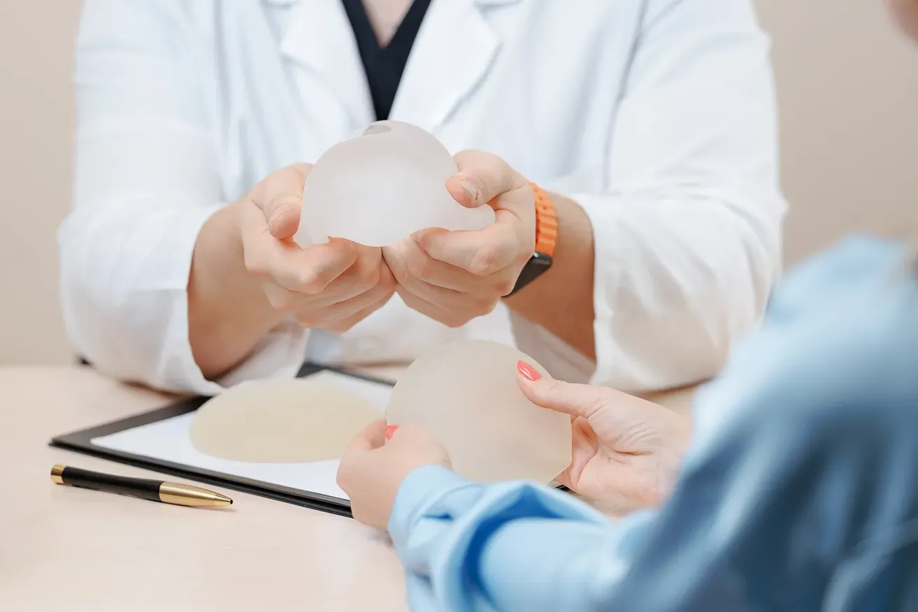 Woman attending a plastic surgery consultation while discussing treatment options