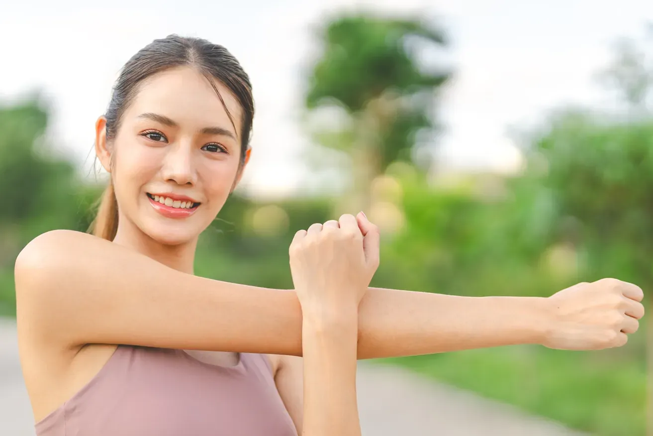 Woman stretching post-operation