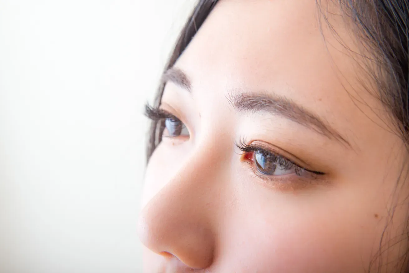 Close up of woman’s eyes with double eyelids